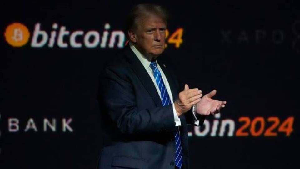 Bitcoin hits $100,000 for first time as Trump pledges crypto deregulation